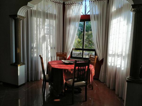 Villa con Vista al Jardín